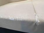 Sofa beżowa z przetarciami